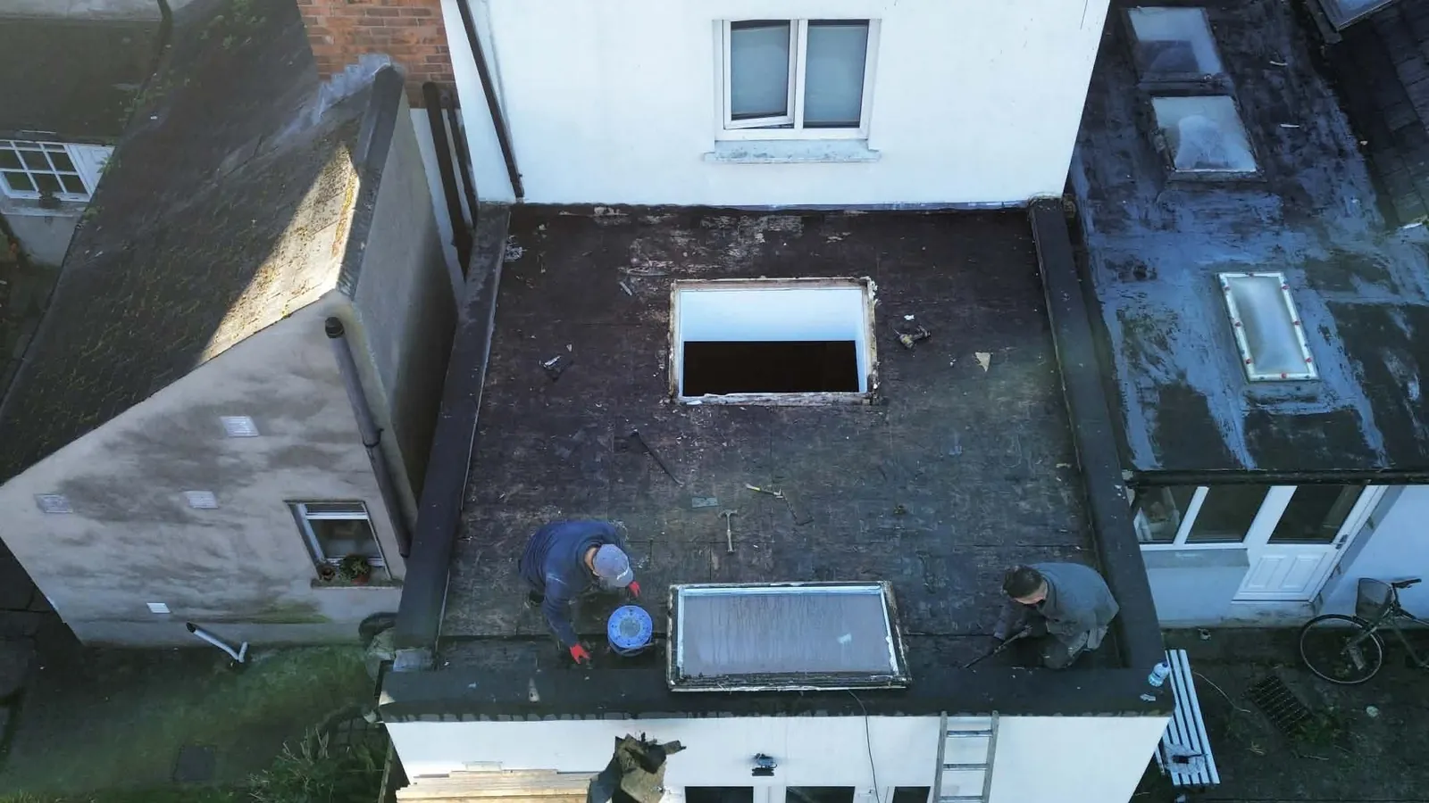 The old extension roof being stripped in Kilmainham