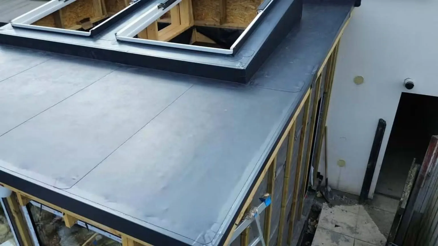 Grey PVC membrane across the Saggart extension roof