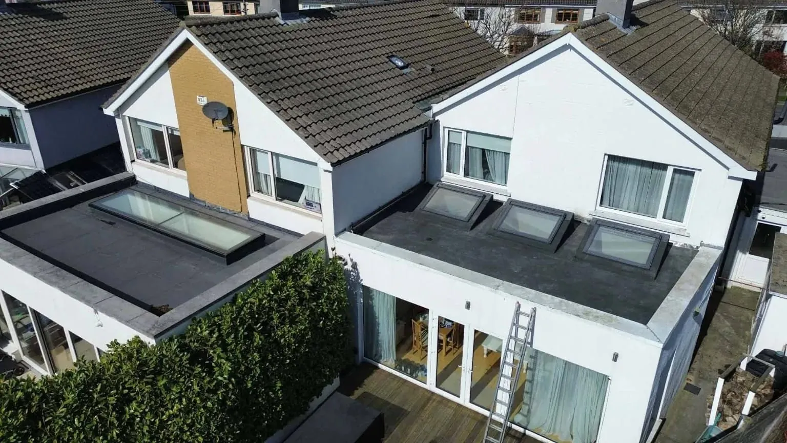 Finished torch-on felt roof with three rooflights on an extension in Blackrock