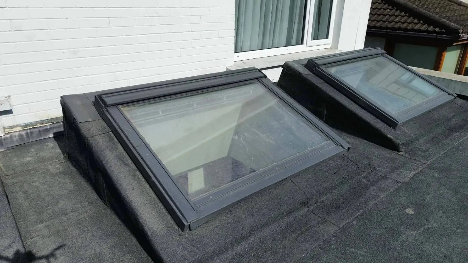 Close-up of a rooflight upstand dressed in felt, Blackrock