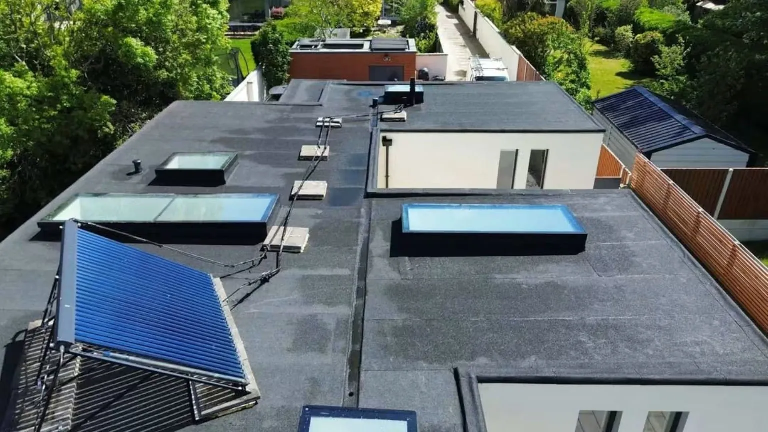 Felt dressed around rooflights and solar panels, Dun Laoghaire