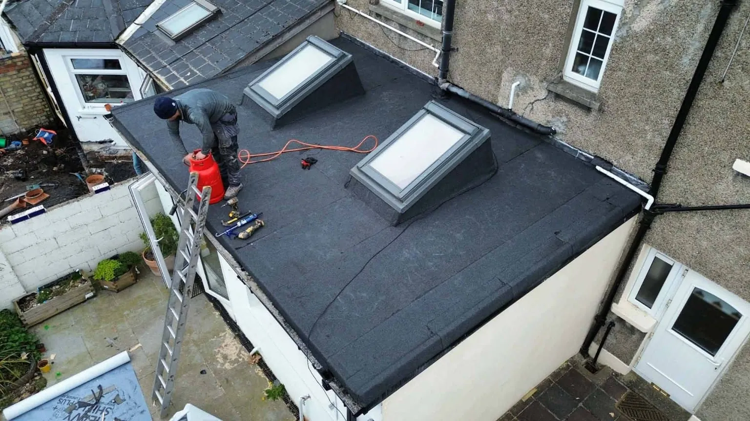Finished torch-on felt roof with two roof windows in Kimmage